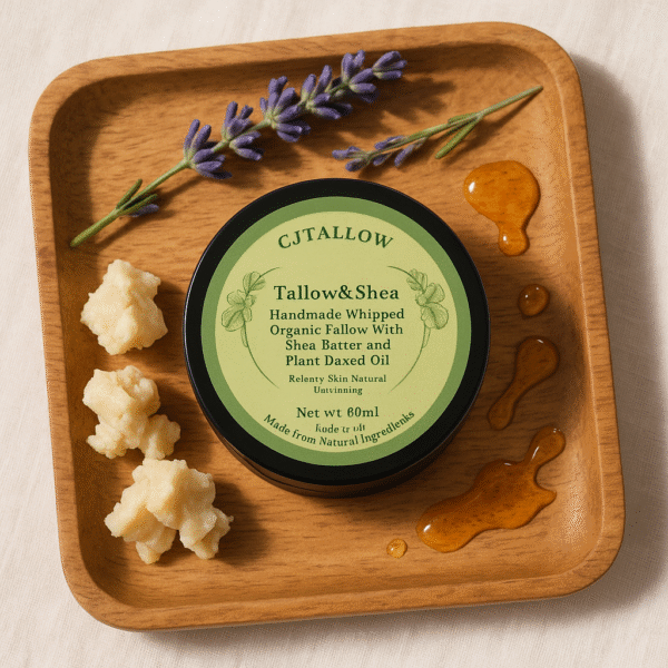 CJTALLOW Tallow & Shea Balm jar on a wooden tray with raw shea butter pieces, lavender sprigs, and honey drops – natural whipped skincare product flat lay.
