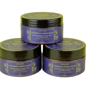 60ml jar of Neroli-scented whipped organic pasture-raised British tallow by CJTALLOW, blended with plant-based oils for natural skin hydration and nourishment. In Navy blue packaging. Made with natural ingredients to help retain skin's natural moisture.