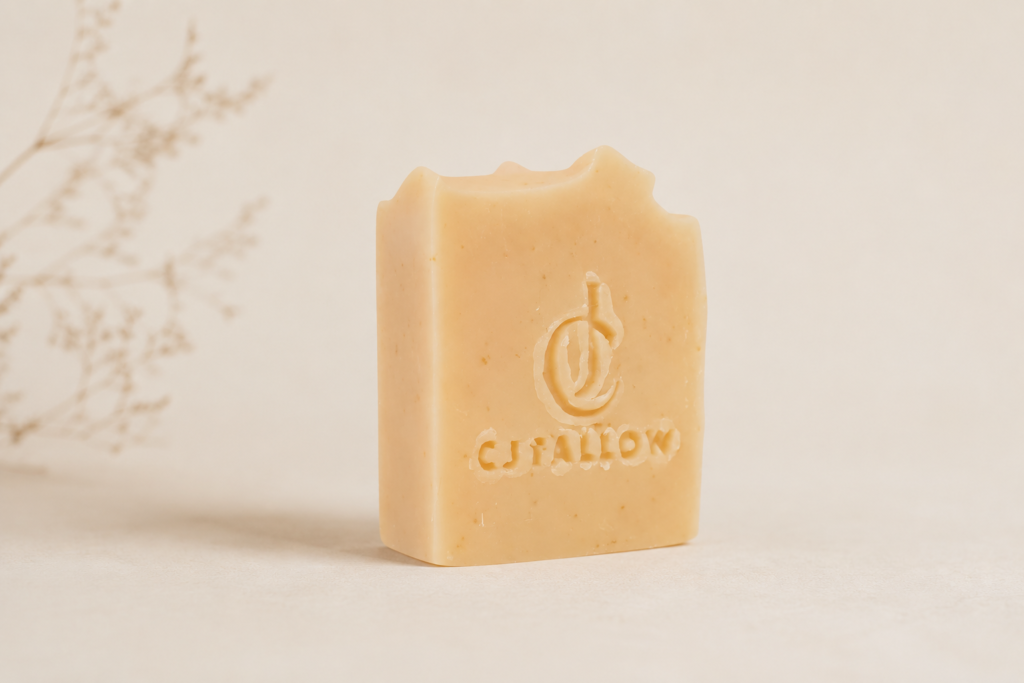 CJTallow Goat Milk and Oats Tallow Soap displayed in a minimalist natural setting