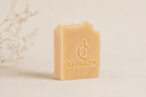 CJTallow Goat Milk and Oats Tallow Soap displayed in a minimalist natural setting